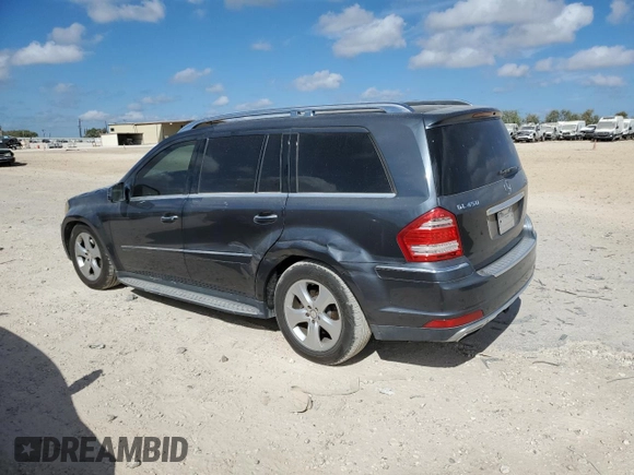 2011 Mercedes-Benz GL-Class GL 450 with VIN 4JGBF7BE2BA654807, listed as a Copart auction lot 77133244 with 133,748 mi miles and Salvage Title. Bid and sale history available at carsss.com. Image 2.