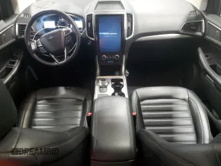 2023 Ford Edge SEL z VIN 2FMPK4J94PBA22570, wystawiony jako Copart lot #56350435 z przebiegiem 27 761 mil mil oraz Szkoda całkowita • Salvage title. Historia ofert i sprzedaży dostępna na DreamBid. Obrazek 8.