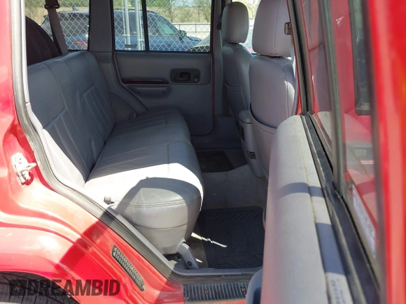 1997 Jeep Cherokee Country with VIN 1J4FJ78SXVL568925, listed as a IAAI auction lot 42254459 with Not provided miles and . Bid and sale history available at DreamBid. Image 8.