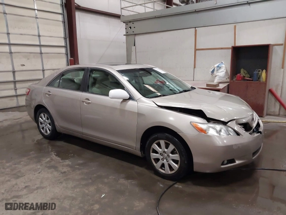 2007 Toyota Camry CE with VIN 4T1BE46K87U712670, listed as a IAAI auction lot 41797440 with 202,595 mi miles. Bid and sale history available at carsss.com. Image 1.