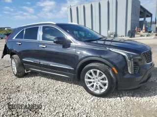 2023 Cadillac XT4 FWD Luxury with VIN 1GYAZAR4XPF104311, listed as a Copart auction lot 46891635 with 28,972 mi miles and Non repairable. Bid and sale history available at DreamBid. Image 4.