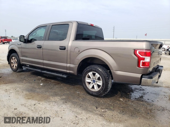 2018 Ford F-150 XL with VIN 1FTEW1CB3JFB73176, listed as a Copart auction lot 58741785 with 153,162 mi miles and Salvage title. Bid and sale history available at DreamBid. Image 2.