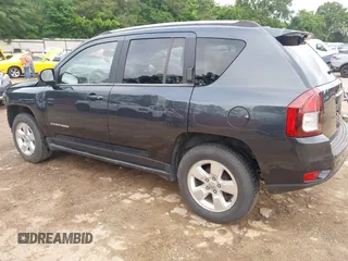 2014 Jeep Compass Sport with VIN 1C4NJCBA1ED725875, listed as a IAAI auction lot 42118863 with 133,136 mi miles. Bid and sale history available at carsss.com. Image 3.