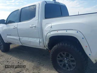 2023 Toyota Tacoma SR with VIN 3TYCZ5AN2PT112854, listed as a IAAI auction lot 42220025 with 43,657 mi miles and . Bid and sale history available at DreamBid. Image 22.