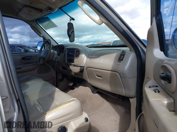 2003 Ford F-150 XLT with VIN 1FTRW07L53KD82167, listed as a IAAI auction lot 41745801 with 216,783 mi miles. Bid and sale history available at carsss.com. Image 5.