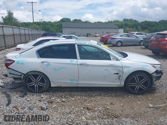 2017 Honda Accord Touring with VIN 1HGCR3F98HA003410, listed as a IAAI auction lot 42534659 with 211,470 mi miles and . Bid and sale history available at DreamBid. Image 14.