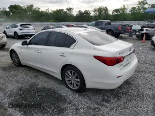 2014 Infiniti Q50 Premium с VIN JN1BV7ARXEM697759, выставлен на аукционе Copart как лот 55996815 с пробегом 129 642 миль миль и Списание • Salvage title. История ставок и продаж доступна на DreamBid. Изображение 2.
