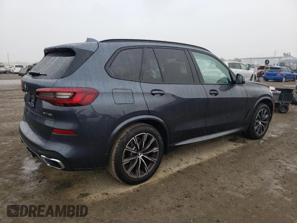 2021 BMW X5 sDrive40i with VIN 5UXCR4C01M9E98458, listed as a Copart auction lot 44289113 with 26,672 mi miles. Bid and sale history available at carsss.com. Image 3.