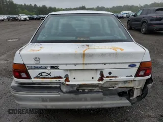 1992 Ford Escort z VIN 1FAPP11J5NW167729, wystawiony jako Copart lot #57692925 z przebiegiem 73 341 mil mil oraz Tytuł czysty. Historia ofert i sprzedaży dostępna na DreamBid. Obrazek 6.