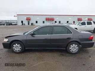 1999 Honda Accord LX with VIN 1HGCG5647XA154131, listed as a IAAI auction lot 41962701 with 126,673 mi miles and . Bid and sale history available at DreamBid. Image 14.