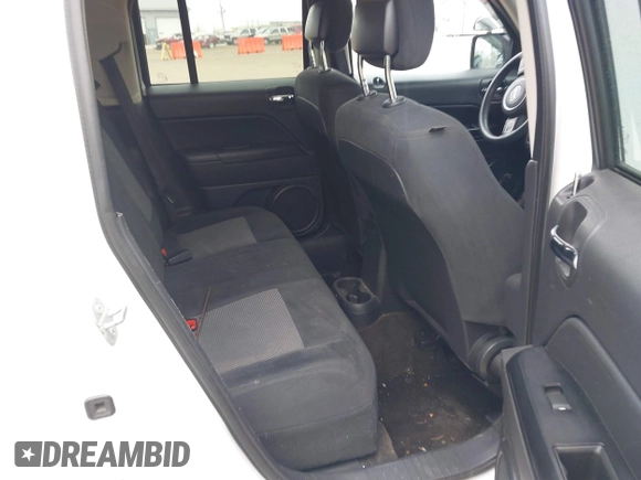 2014 Jeep Patriot Sport with VIN 1C4NJRBB9ED852112, listed as a IAAI auction lot 41886940 with 138,825 mi miles. Bid and sale history available at carsss.com. Image 8.