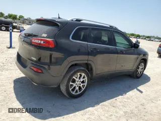 2016 Jeep Cherokee Altitude with VIN 1C4PJLCS0GW171848, listed as a Copart auction lot 52943535 with 141,686 mi miles and Clean Title. Bid and sale history available at carsss.com. Image 3.