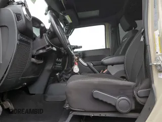 2018 Jeep Wrangler JK Unlimited Rubicon with VIN 1C4BJWFG4JL891312, listed as a Copart auction lot 87041334 with 51,286 mi miles and Salvage Title. Bid and sale history available at carsss.com. Image 7.