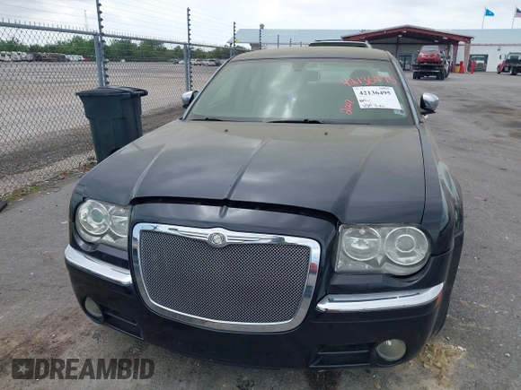 2007 Chrysler 300 C with VIN 2C3LA63H97H861511, listed as a IAAI auction lot 42136495 with 113,972 mi miles. Bid and sale history available at carsss.com. Image 6.