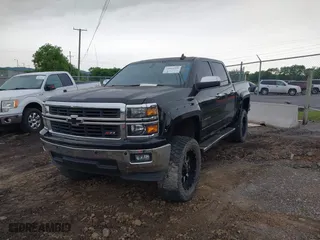 2015 Chevrolet Silverado 1500 LT with VIN 3GCUKREC9FG142970, listed as a IAAI auction lot 42064960 with 77,479 mi miles. Bid and sale history available at carsss.com. Image 6.