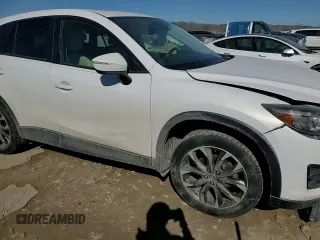 2016 Mazda CX-5 Grand Touring with VIN JM3KE4DYXG0781063, listed as a Copart auction lot 47099825 with 0 mi miles and Salvage Title. Bid and sale history available at carsss.com. Image 10.
