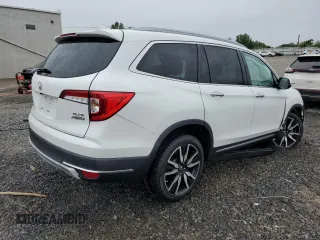 2021 Honda Pilot Elite with VIN 5FNYF6H01MB057789, listed as a Copart auction lot 58543815 with 60,602 mi miles and Salvage title. Bid and sale history available at DreamBid. Image 3.