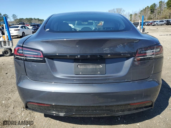 2023 Tesla Model S with VIN 5YJSA1E54PF516907, listed as a Copart auction lot 49372825 with 24,556 mi miles and Salvage Title. Bid and sale history available at carsss.com. Image 6.