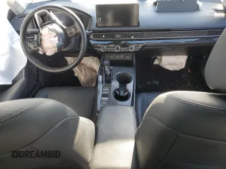 2023 Honda Civic Touring z VIN 2HGFE1F97PH305882, wystawiony jako Copart lot #54826915 z przebiegiem Nie podano mil oraz Szkody całkowita. Historia ofert i sprzedaży dostępna na DreamBid. Obrazek 8.