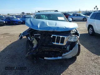 2012 Jeep Grand Cherokee Limited z VIN 1C4RJFBTXCC341813, wystawiony jako IAAI lot #41791662 z przebiegiem 120 811 mil mil oraz . Historia ofert i sprzedaży dostępna na DreamBid. Obrazek 13.
