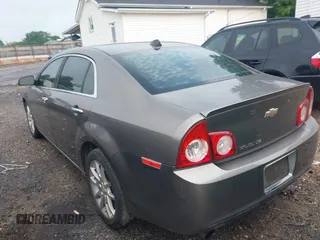 2012 Chevrolet Malibu LTZ with VIN 1G1ZG5E7XCF200982, listed as a IAAI auction lot 42052609 with 196,449 mi miles and . Bid and sale history available at DreamBid. Image 3.