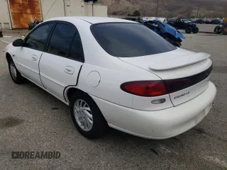 1997 Ford Escort LX with VIN 1FALP13PXVW233269, listed as a Copart auction lot 43921875 with 58,621 mi miles and Clean Title. Bid and sale history available at carsss.com. Image 2.