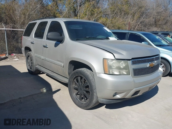 2007 Chevrolet Tahoe LT z VIN 1GNFC13077R105182, wystawiony jako IAAI lot #41649825 z przebiegiem Nie podano mil oraz . Historia ofert i sprzedaży dostępna na DreamBid. Obrazek 1.