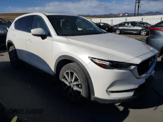 2018 Mazda CX-5 Grand Touring with VIN JM3KFADM3J1410210, listed as a Copart auction lot 44031365 with 69,016 mi miles and Clean Title. Bid and sale history available at DreamBid. Image 4.