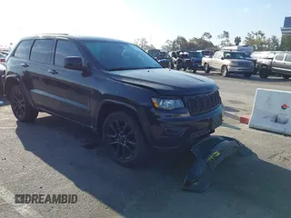 2018 Jeep Grand Cherokee Altitude with VIN 1C4RJEAG2JC430688, listed as a IAAI auction lot 41851808 with 82,959 mi miles. Bid and sale history available at carsss.com. Image 1.