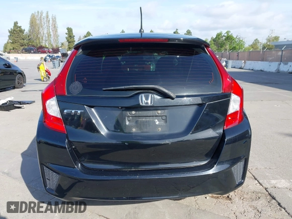 2015 Honda Fit LX with VIN 3HGGK5G5XFM737172, listed as a IAAI auction lot 42053332 with 80,690 mi miles. Bid and sale history available at carsss.com. Image 16.
