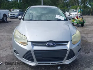 2013 Ford Focus SE with VIN 1FADP3F28DL217636, listed as a IAAI auction lot 42465123 with 187,088 mi miles and . Bid and sale history available at DreamBid. Image 13.