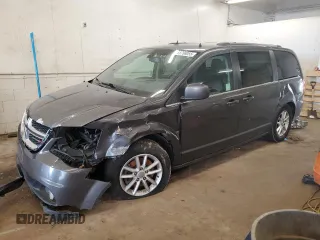 2018 Dodge Grand Caravan SXT z VIN 2C4RDGCG1JR207470, wystawiony jako Copart lot #58768055 z przebiegiem 282 130 mil mil oraz Szkoda całkowita • Salvage title. Historia ofert i sprzedaży dostępna na DreamBid. Obrazek 1.