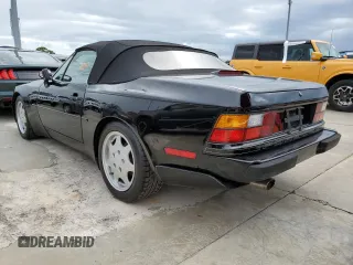 1990 Porsche 944 z VIN WP0CB2946LN480366, wystawiony jako Copart lot #74369454 z przebiegiem 78 709 mil mil oraz Szkoda całkowita • Salvage title. Historia ofert i sprzedaży dostępna na DreamBid. Obrazek 2.