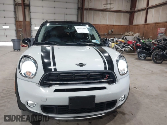 2016 MINI Countryman S with VIN WMWZC5C57GWU20085, listed as a IAAI auction lot 42403406 with 90,592 mi miles and . Bid and sale history available at DreamBid. Image 13.