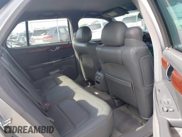 2005 Cadillac DeVille z VIN 1G6KD54Y65U192442, wystawiony jako IAAI lot #42257163 z przebiegiem 100 381 mil mil oraz . Historia ofert i sprzedaży dostępna na DreamBid. Obrazek 8.