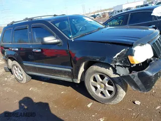 2008 Jeep Grand Cherokee Laredo with VIN 1J8GR48K98C193110, listed as a IAAI auction lot 41833331 with 174,518 mi miles. Bid and sale history available at carsss.com. Image 14.