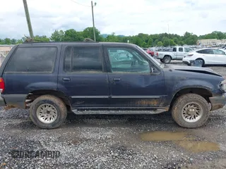 1999 Ford Explorer XL z VIN 1FMDU34X5XUC08663, wystawiony jako IAAI lot #42385444 z przebiegiem 177 387 mil mil oraz . Historia ofert i sprzedaży dostępna na DreamBid. Obrazek 13.