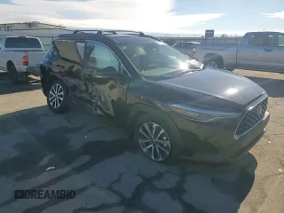 2024 Toyota Corolla Cross XLE with VIN 7MUDAAAGXRV073103, listed as a Copart auction lot 86753294 with 5,667 mi miles and Salvage title. Bid and sale history available at DreamBid. Image 11.