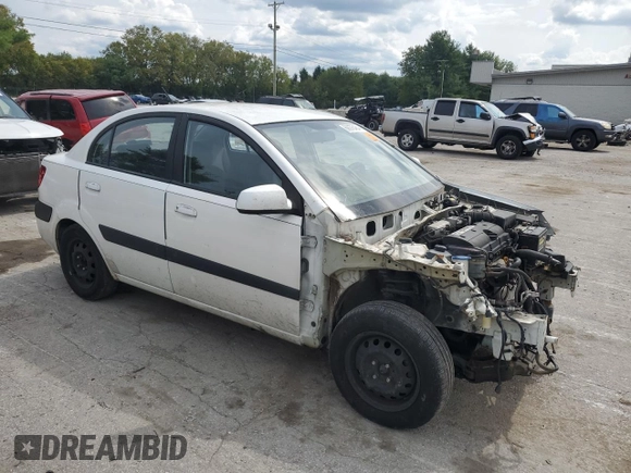2009 Kia Rio LX with VIN KNADE223996526222, listed as a Copart auction lot 69976484 with 318,702 mi miles and Salvage Title. Bid and sale history available at DreamBid. Image 4.