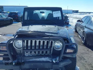 1999 Jeep Wrangler Sport with VIN 1J4FY19SXXP456810, listed as a IAAI auction lot 41725834 with 93,151 mi miles. Bid and sale history available at carsss.com. Image 12.