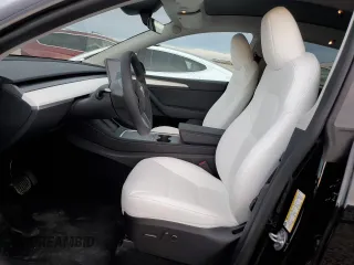 2025 Tesla Model Y Long Range z VIN 7SAYGDED9SF313959, wystawiony jako Copart lot #52823755 z przebiegiem 1 137 mil mil oraz Szkoda całkowita • Salvage title. Historia ofert i sprzedaży dostępna na DreamBid. Obrazek 7.