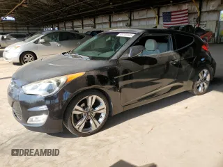 2013 Hyundai Veloster w/Red Int z VIN KMHTC6AD8DU148559, wystawiony jako Copart lot #65765945 z przebiegiem Nie podano mil oraz Czysty tytuł • Clean title. Historia ofert i sprzedaży dostępna na DreamBid. Obrazek 1.