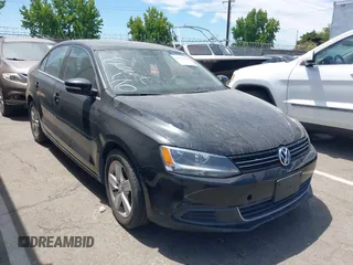 2013 Volkswagen Jetta TDI w/Premium/Nav z VIN 3VWLL7AJ4DM371540, wystawiony jako IAAI lot #42834989 z przebiegiem 116 652 mil mil oraz . Historia ofert i sprzedaży dostępna na DreamBid. Obrazek 1.