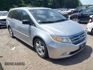 2012 Honda Odyssey Touring with VIN 5FNRL5H9XCB026741, listed as a IAAI auction lot 42808245 with 293,422 mi miles and . Bid and sale history available at DreamBid. Image 1.