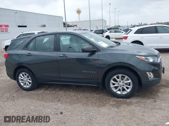 2018 Chevrolet Equinox LS with VIN 3GNAXHEV0JS506562, listed as a IAAI auction lot 41925572 with 97,031 mi miles and . Bid and sale history available at DreamBid. Image 13.