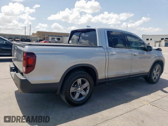 2021 Honda Ridgeline RTL-E with VIN 5FPYK3F73MB008806, listed as a Copart auction lot 62234825 with 84,716 mi miles and Salvage title. Bid and sale history available at DreamBid. Image 3.