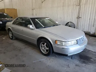 2000 Cadillac Seville Luxury SLS z VIN 1G6KS54Y5YU205420, wystawiony jako Copart lot #73254744 z przebiegiem 220 753 mil mil oraz Nie do naprawy • Non repairable. Historia ofert i sprzedaży dostępna na DreamBid. Obrazek 4.