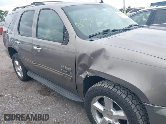 2012 Chevrolet Tahoe LT z VIN 1GNSCBE08CR136971, wystawiony jako IAAI lot #42211242 z przebiegiem 214 910 mil mil oraz . Historia ofert i sprzedaży dostępna na DreamBid. Obrazek 6.