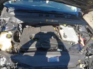 2019 Ford Fusion Hybrid SE with VIN 3FA6P0LU1KR235021, listed as a IAAI auction lot 41660786 with 93,331 mi miles. Bid and sale history available at carsss.com. Image 10.