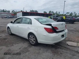 2010 Toyota Avalon XL with VIN 4T1BK3DB8AU354533, listed as a IAAI auction lot 41802797 with 117,956 mi miles and . Bid and sale history available at carsss.com. Image 3.